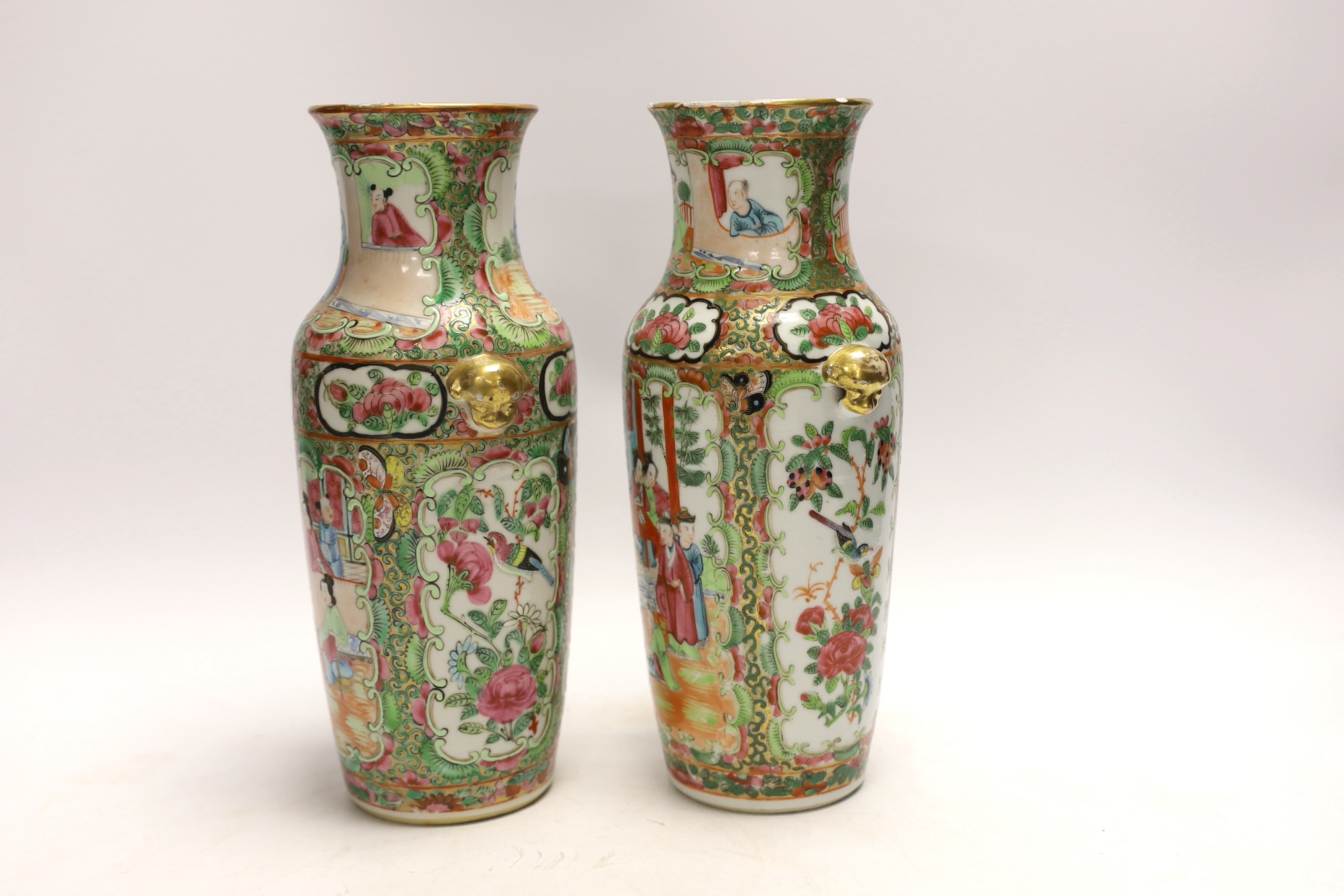 A pair of Chinese Canton famille rose vases, late Qing dynasty, 26cm